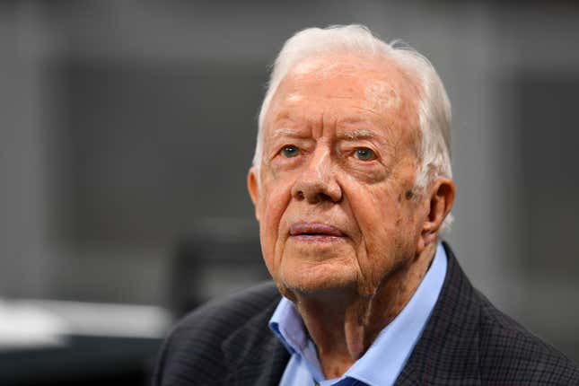 ATLANTA, GA - SEPTEMBER 30: Former president Jimmy Carter prior to the game between the Atlanta Falcons and the Cincinnati Bengals at Mercedes-Benz Stadium on September 30, 2018 in Atlanta, Georgia.