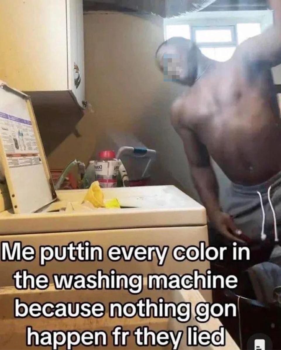 Man casually loads washing machine, caption jokes about ignoring color separation in laundry