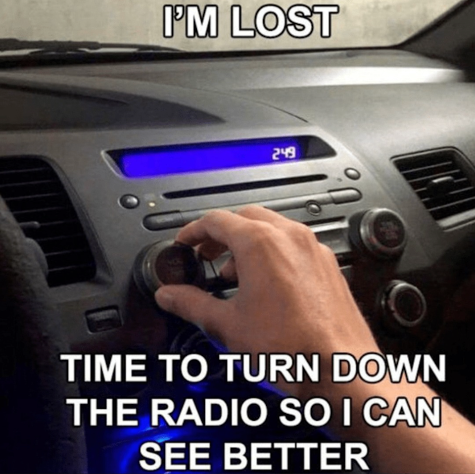 A hand adjusts car radio volume; text: "I'm lost. Time to turn down the radio so I can see better." Clock shows 2:49