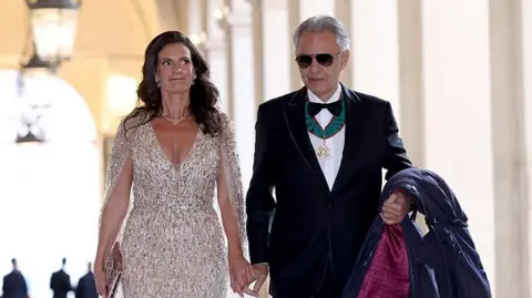 Getty Images Andrea Bocelli and wife Veronica Bocelli arrive at the Quirinale Palace