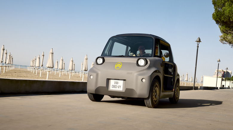 front view of a gray Ami on the boardwalk