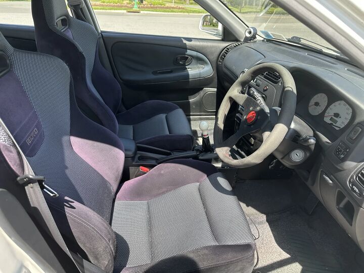 used car of the day 1998 mitsubishi lancer evolution