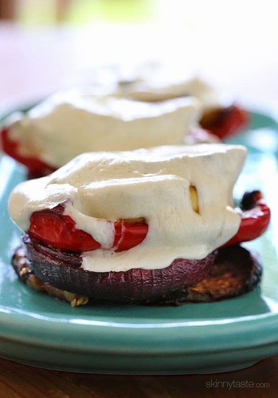 Grilled Vegetable Towers with Mozzarella are layered with grilled, marinated eggplant, zucchini, yellow squash, red onion and bell peppers topped with fresh mozzarella.