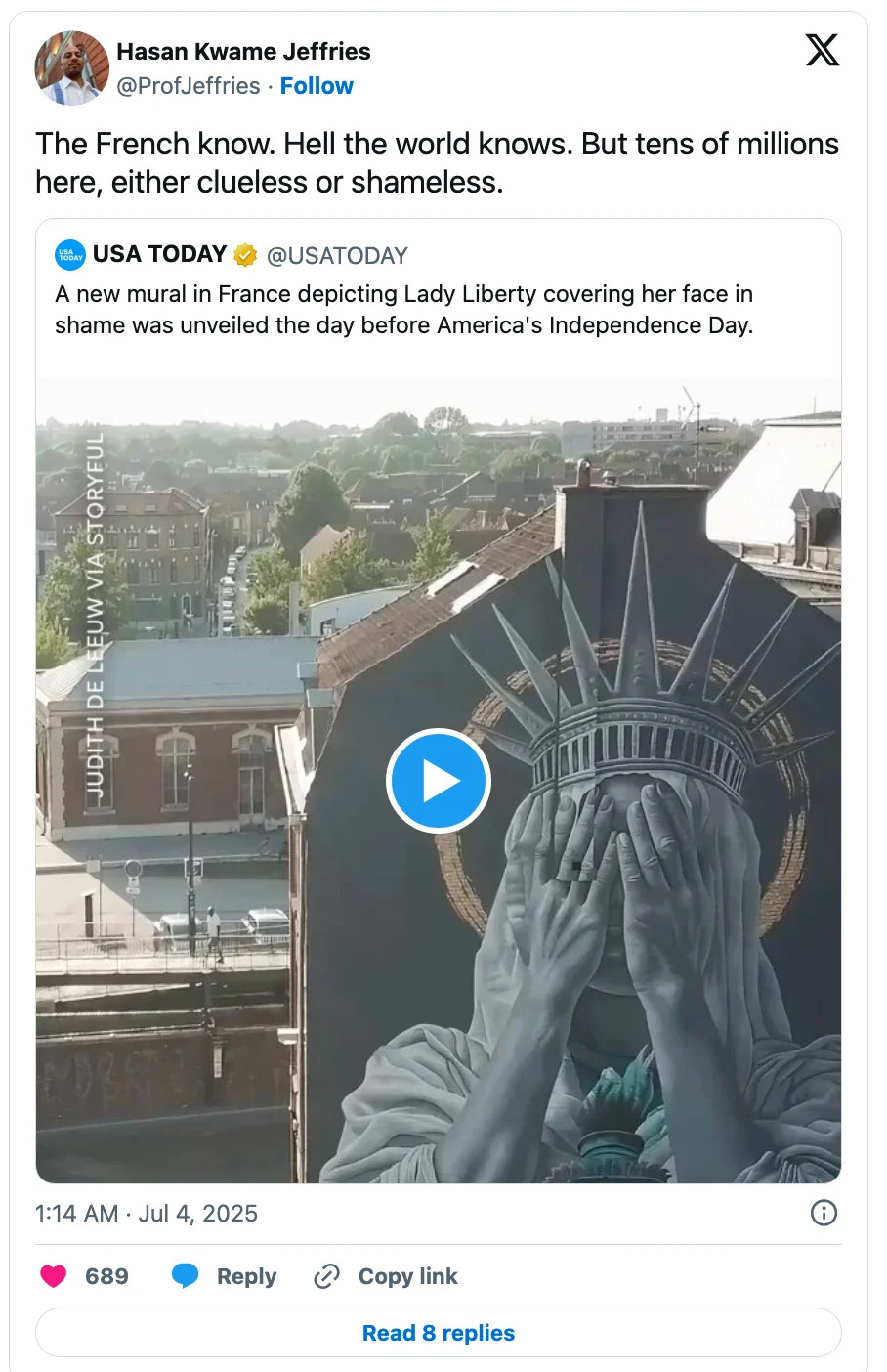 Tweet showing a mural of the Statue of Liberty covering her face, suggesting commentary on current events
