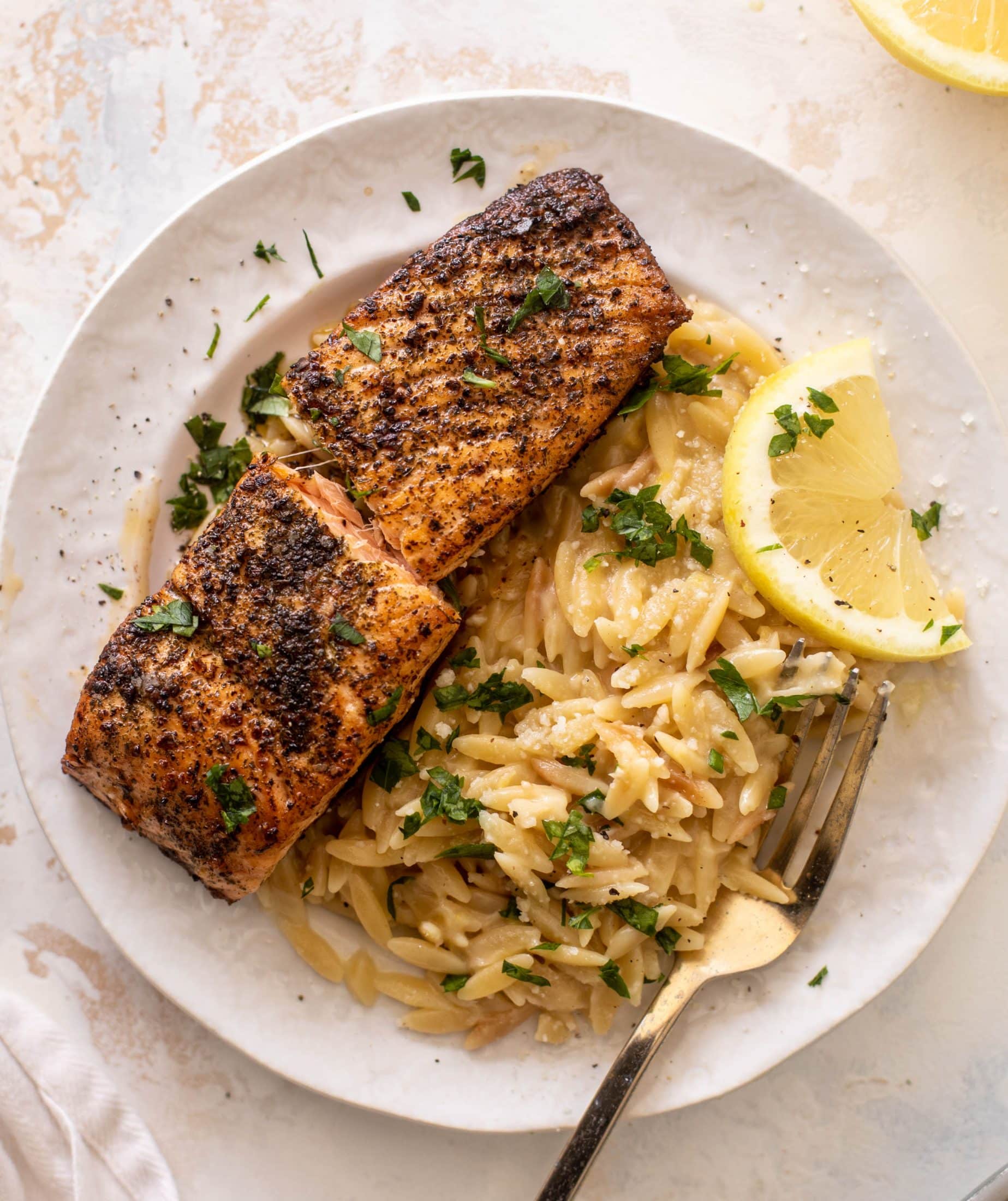 salmon aglio olio with lemon parm orzo