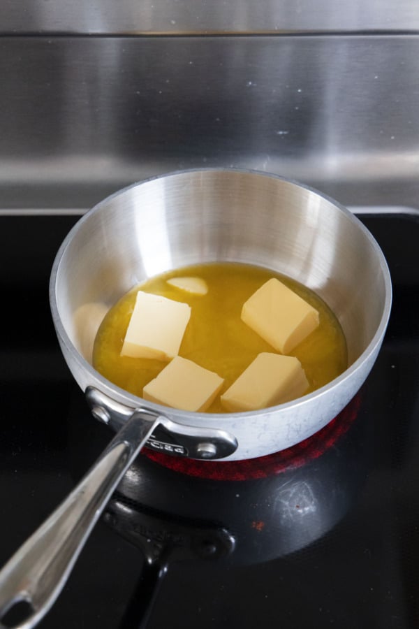 Melting butter in a small saucepan over medium heat.