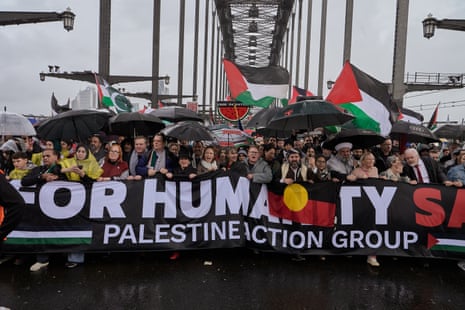 People marching across the Sydney Harbour Bridge on behalf of people living in Gaza
