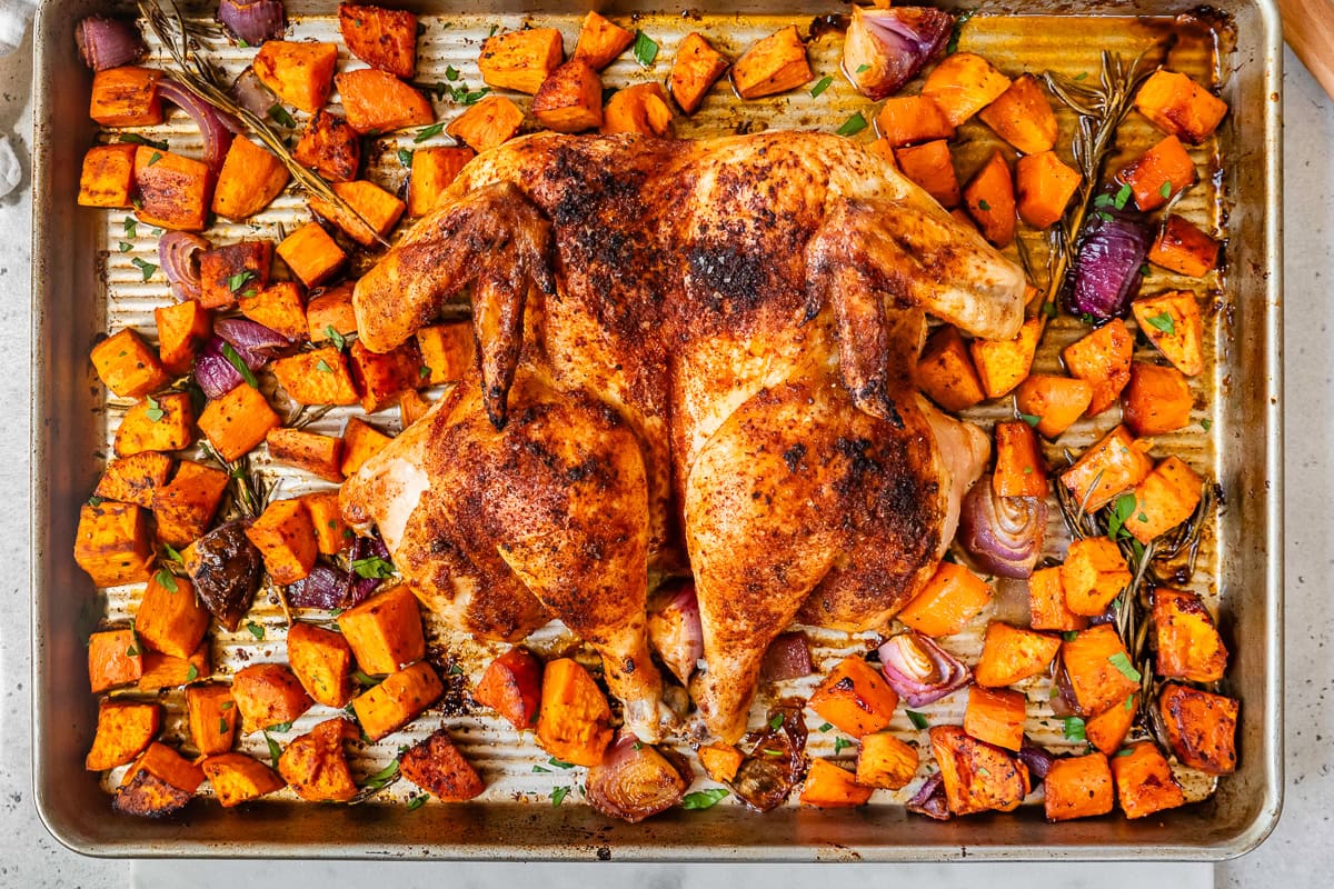 Spatchcock Chicken with Sweet Potatoes on a sheet pan