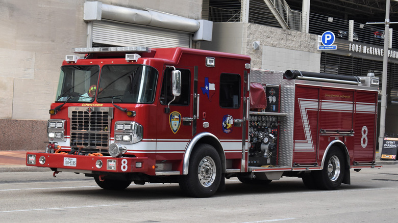 Front 3/4 Houston Fire Department truck on the street